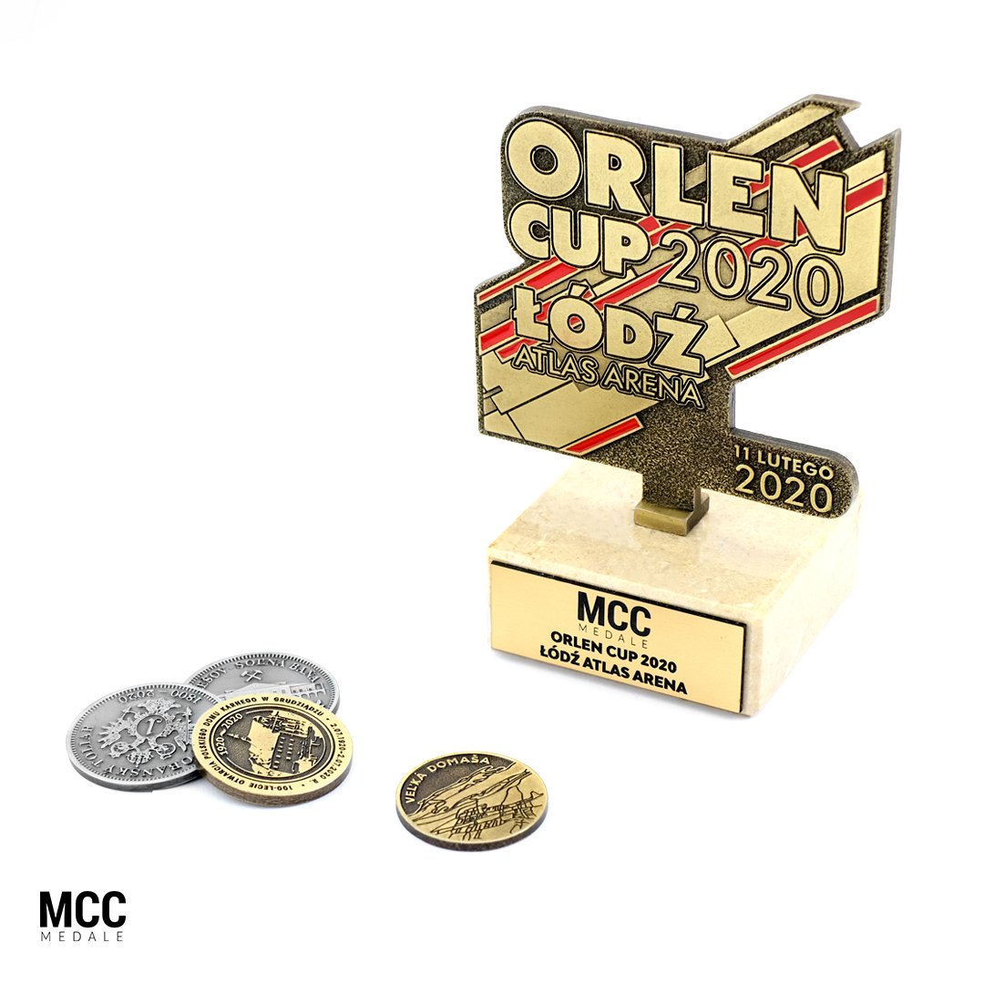 Statuetki i monety grawerowane na prezent wykonane przez MCC Medale