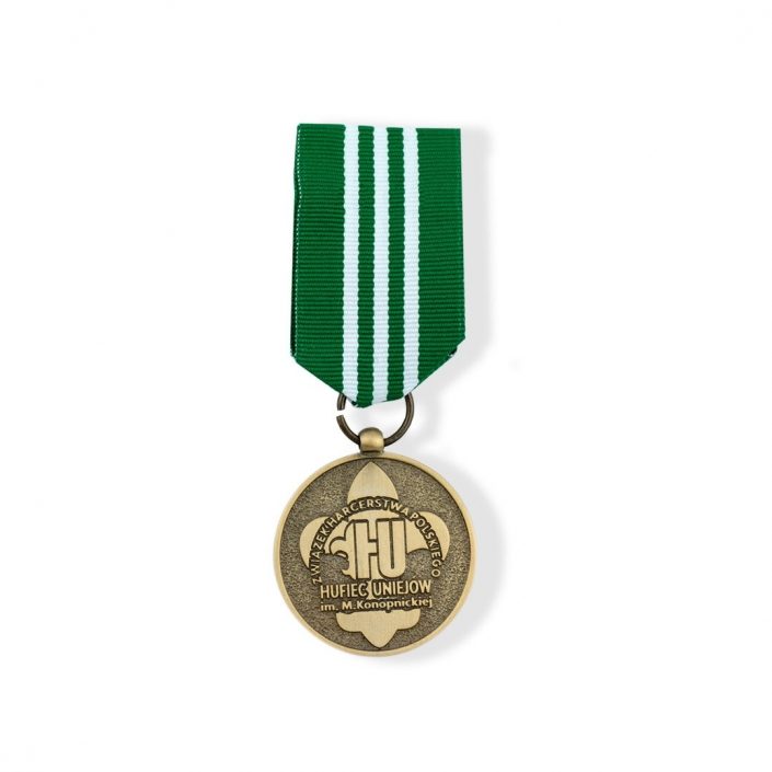 Pamiątkowy order harcerski w barwie złotej, wyprodukowany przez MCC Medale