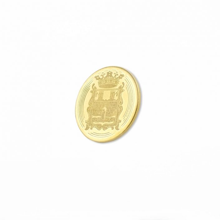 Moneta bita w kolorze złota z motywem herbu miejskiego