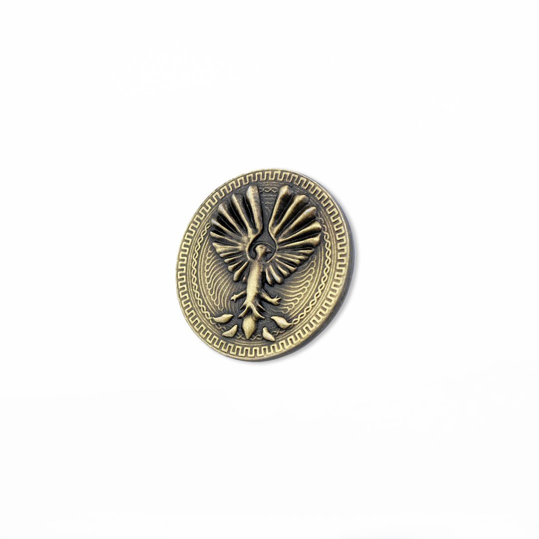 Moneta odlewana w kolorze złotym z motywem Feniksa