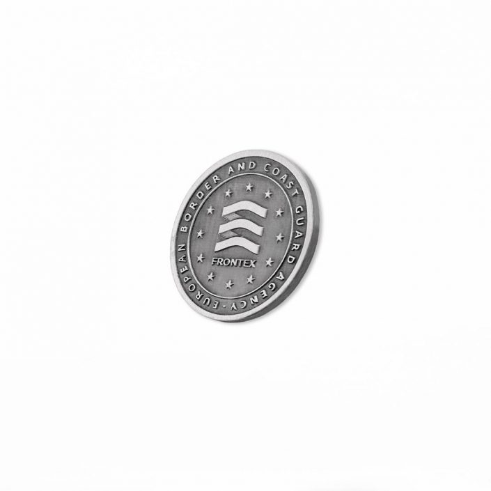 Coin pamiątkowy, jednokolorowy w barwie srebrnej dla agencji Frontex